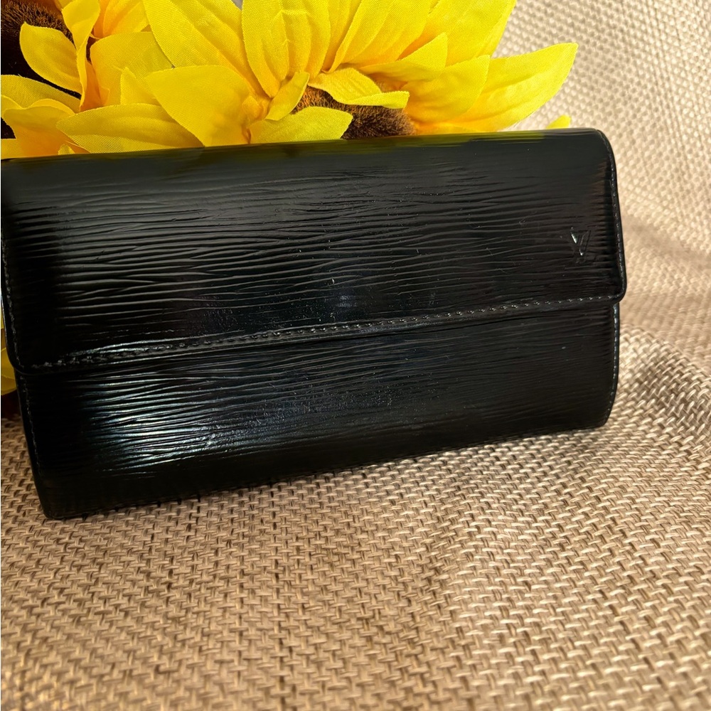 Authentic Black Louis Vuitton long wallet with gorgeous blue interior. LV